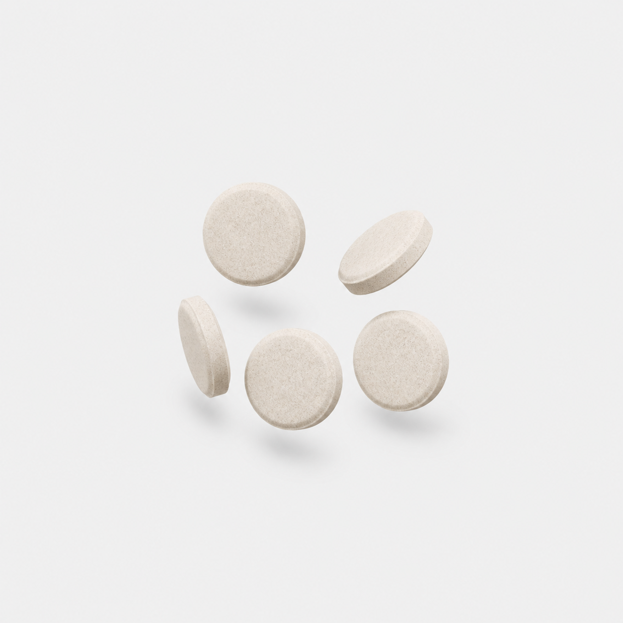 Five Beauty Drink Collagen + C effervescent tablets floating on a light background