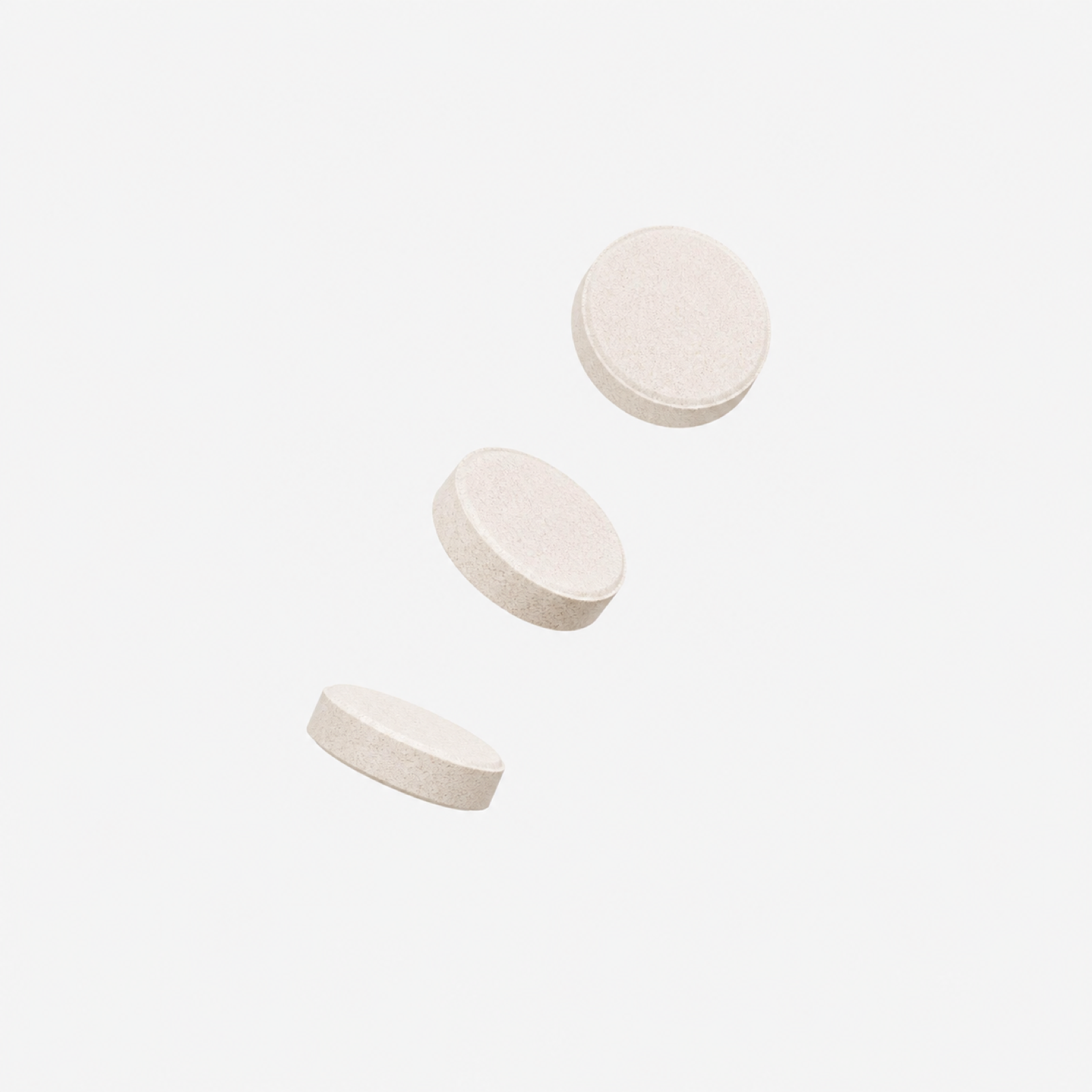 Three Sanotact Energy effervescent tablets floating